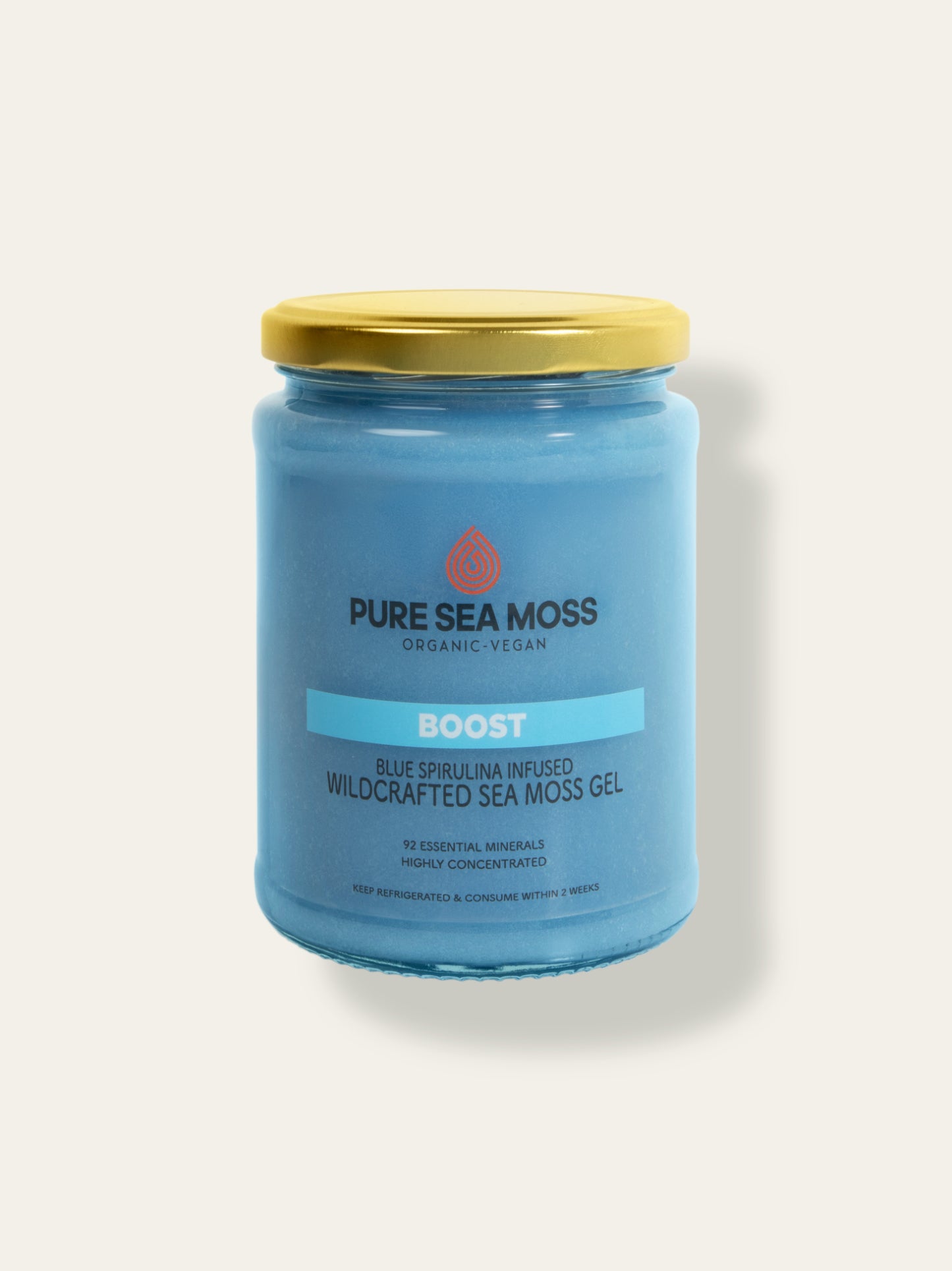 Jar of Blue spirulina infused Pure Sea Moss on a white background
