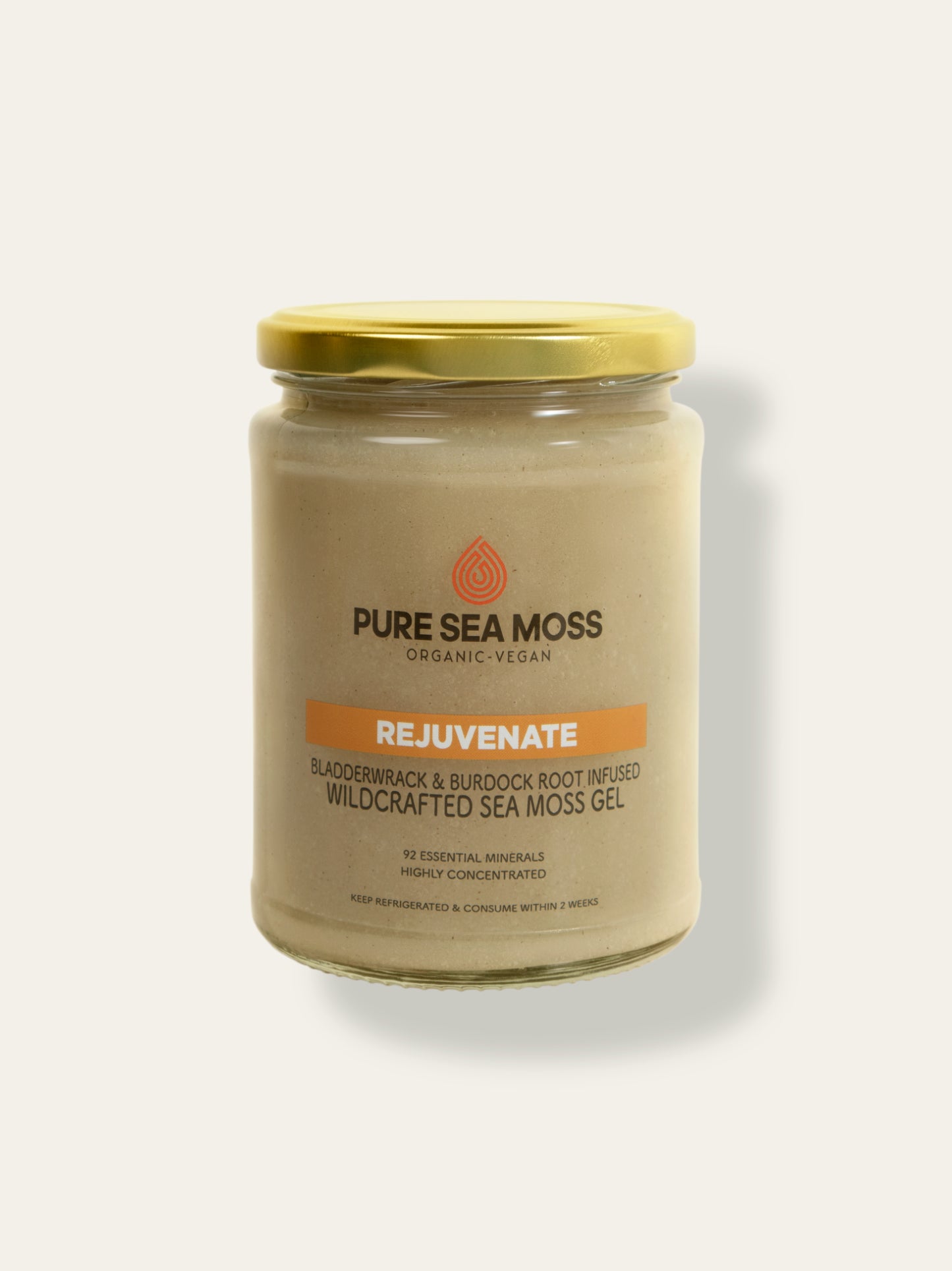 Jar of Pure Sea Moss gel infused with Bladderwrack and burdock root with a gold lid on a white background